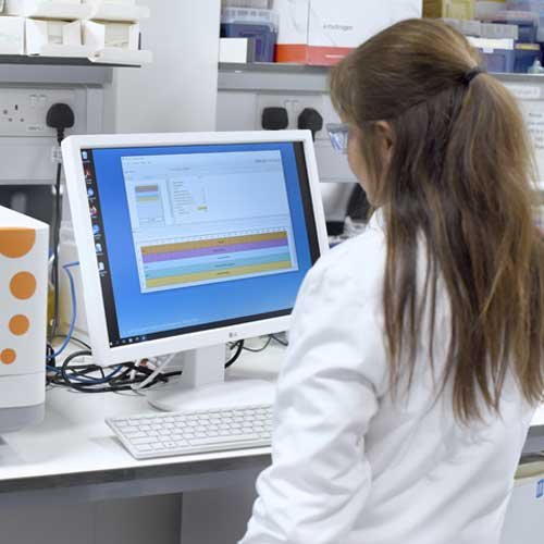 The Centre A scientist viewing a computer monitor